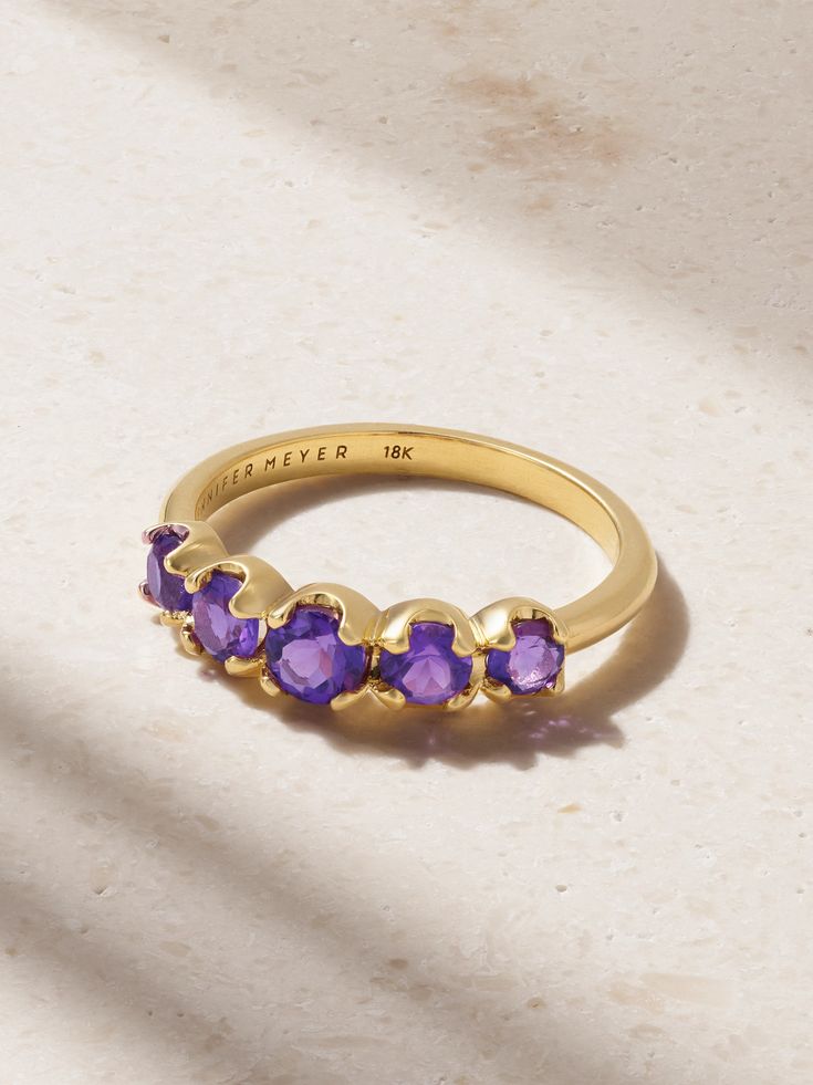 Jennifer Meyer's jewelry is "intended to become a seamless extension of those wearing it." Handcrafted from 18-karat gold, this ring is set with a row of majestic amethysts that graduate in size across the top of the band. Dainty Gemstone Jewelry, Gold Amethyst Ring, Jennifer Meyer Jewelry, Amethyst And Diamond Ring, Jennifer Meyer, Ring Minimalist, Ring Dainty, Jewelry Wedding, Gift Handmade