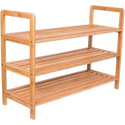 a wooden shelf with two shelves on each side