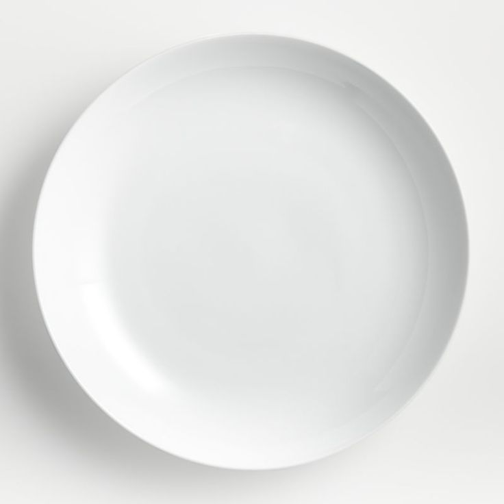 an empty white plate on a white background