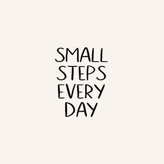 the words small steps every day written in black ink