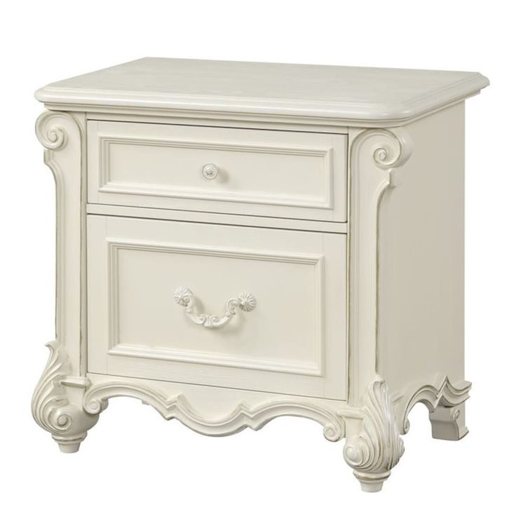 a white nightstand with two drawers on it