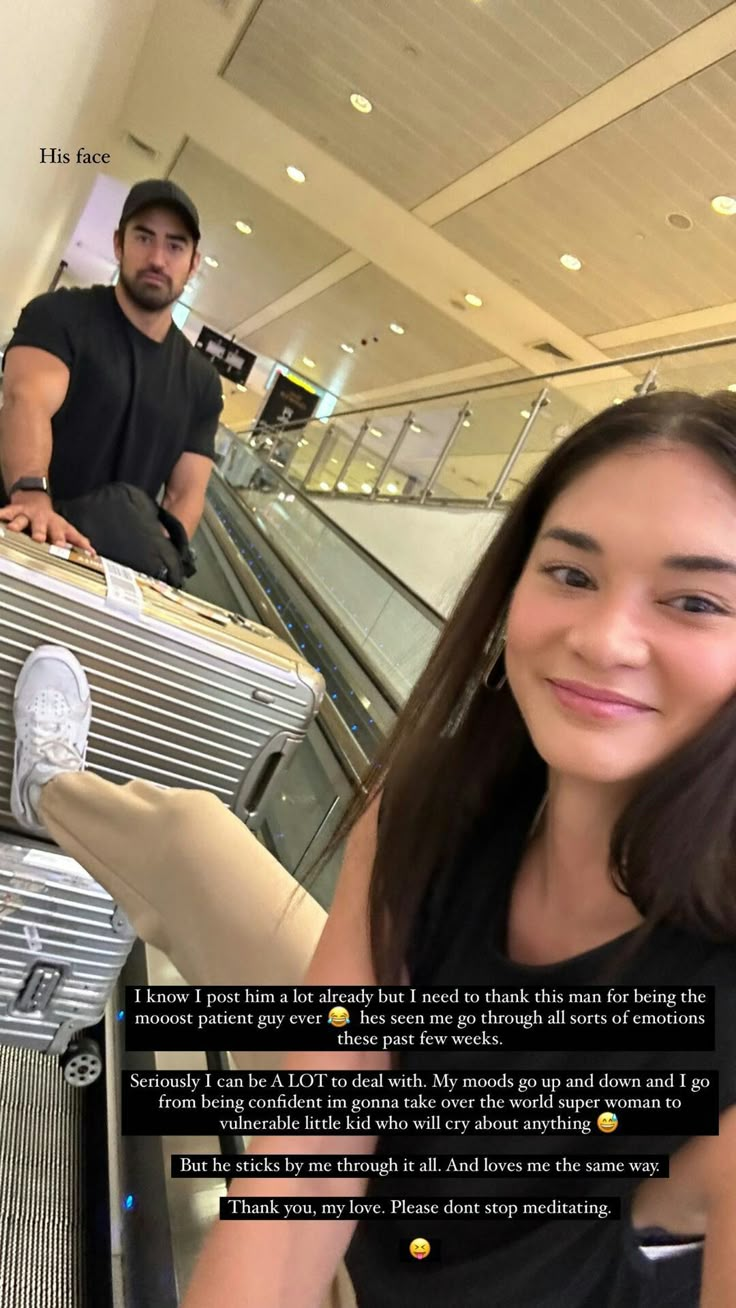 a woman standing next to a man in an airport