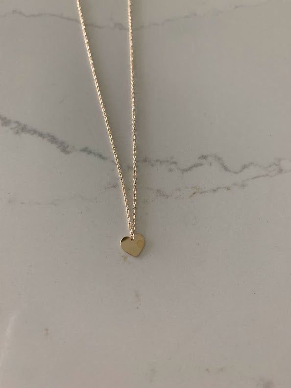 14K Solid Gold Heart Necklace | Yellow Gold Heart | Heart | 14K Solid Gold Heart Necklace | 6MM Heart⁙ Materials: 14K Yellow Gold⁙ Pendant Dimensions: 6MM in Diameter⁙ Necklace Measurements: Heart is 6MM In diameter, the length of the necklace is 18", it can be hooked on 16", 17" and 18" Production Times:⁙ Order processing time varies between 1-3 business days⁙ All orders placed on Saturday, Sunday, or on a national holiday will begin processing the following business day SHIPPING ADDRESSAll ord Necklace Measurements, Gold Necklace Simple, National Holiday, Small Necklace, Gold Flats, Gold Heart Necklace, Yellow Gold Pendants, Saturday Sunday, Gold Heart