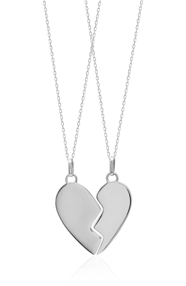 A polished finish adds to the shine of a chain necklace duo that's a perfect way to celebrate your friendship. Set of two necklaces Sterling silver Imported Friendship Necklace With Heart Pendant And Charm, Double Heart Charm Necklace For Friendship, Silver Double Heart Necklaces For Friendship, Silver Heart Charm Necklace For Friendship, Silver Heart Pendant Jewelry For Friendship, Silver Double Heart Necklace For Friendship, Sterling Silver Necklace With Heart Charm For Best Friend, Sterling Silver Heart Jewelry For Friendship, Sterling Silver Heart Pendant Necklace For Friendship