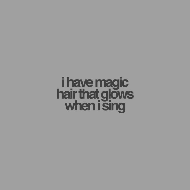 the words i have magic hair that glows when i sing on a gray background