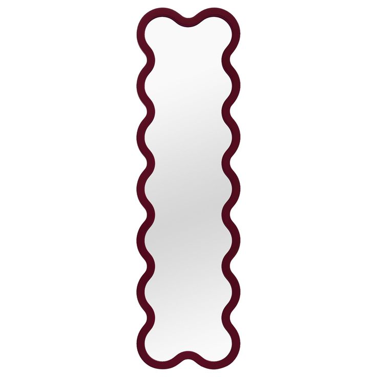 a long mirror with wavy lines on the bottom and sides, hanging from a wall