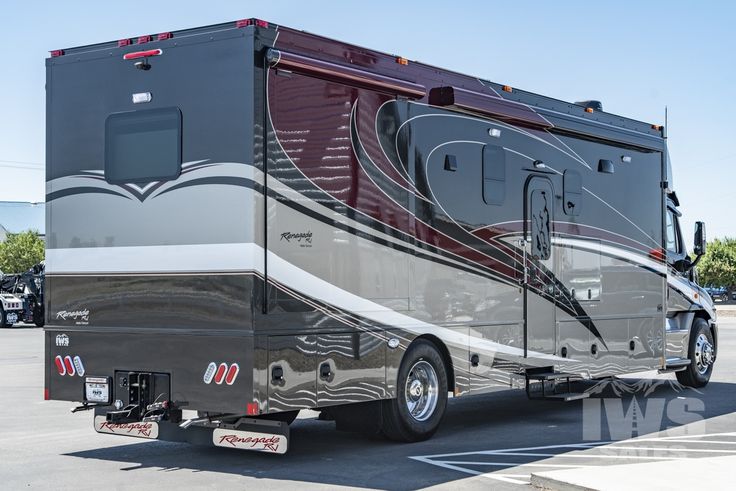 a motor home parked in a parking lot