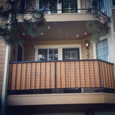 an apartment building with balconies on the balcony