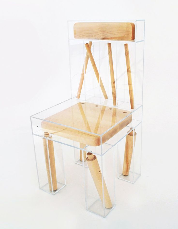 a chair made out of wood and plastic with two wooden handles on each side, sitting in front of a white background