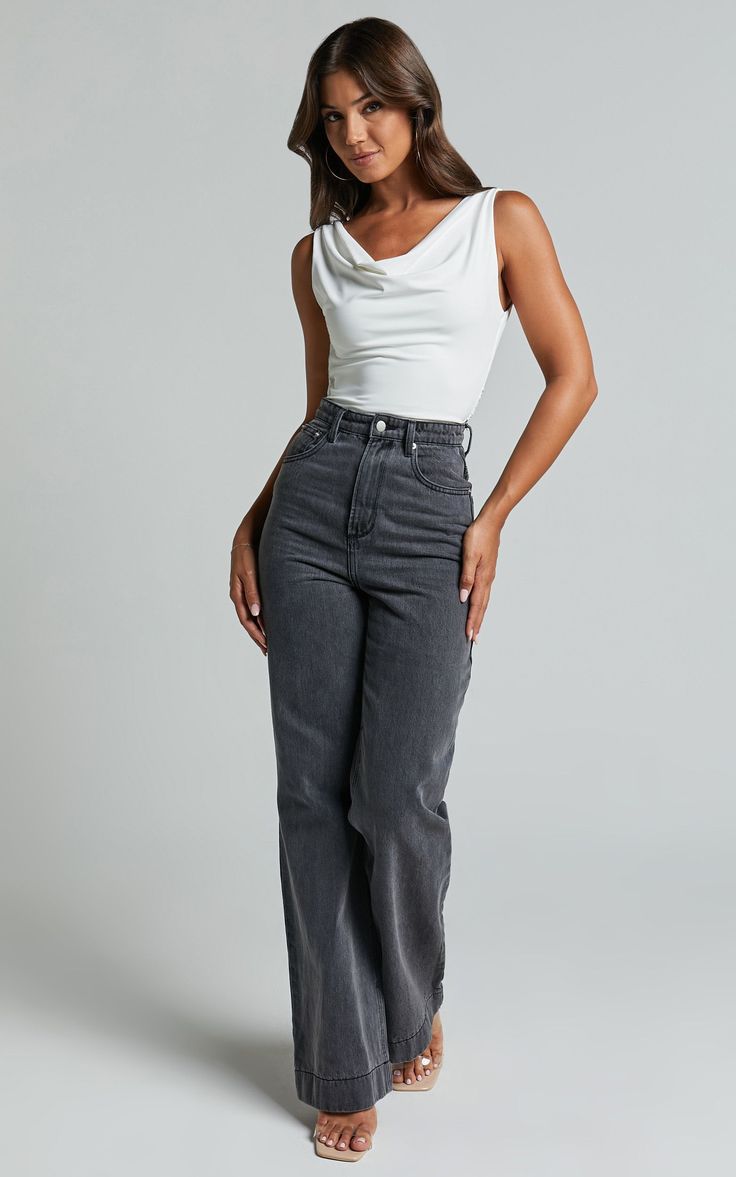 Sleeveless Crop Top Designs For Long Skirt, White Cowl Neck Top Outfit, Cowl Neck Top With Skirt, Party Outfit Jeans And Top, Party Wear Jeans Top Outfit, Party Wear Tops With Jeans, Cowl Top Outfit, Jeans And Top Outfit Going Out, Trendy Jeans Top Outfit