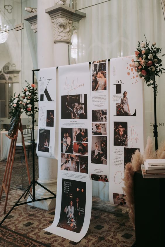 a photo booth set up with pictures and flowers