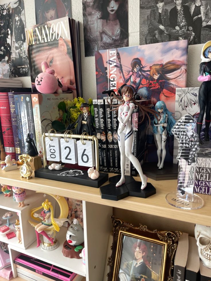 a shelf with figurines and pictures on it