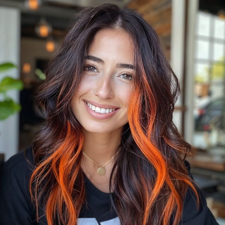 Black And Color Highlights, Dark Hair Orange Money Piece, Black And Orange Highlights, Dark And Orange Hair, Halo Vivid Hair Color, Orange Money Piece Hair Brunette, Dimensional Vivid Hair, Brown And Vivid Hair, Subtle Peekaboo Hair Color Brunettes