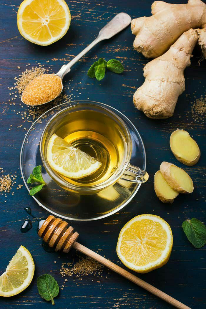 ginger tea with lemons and honey on the table