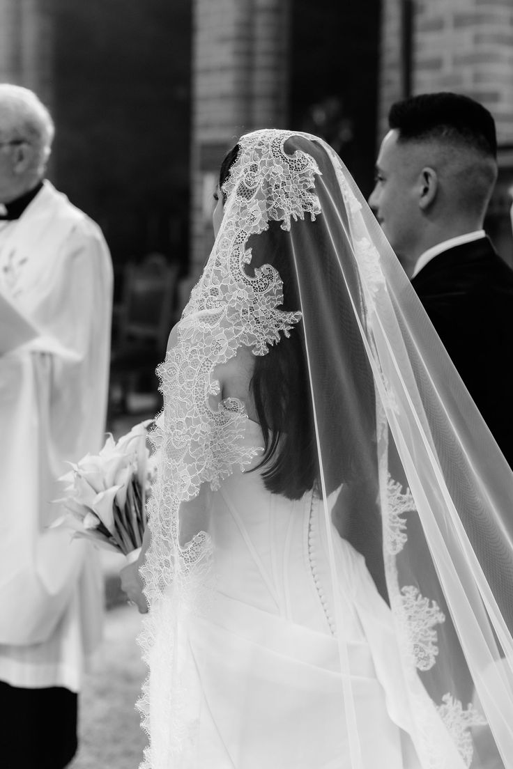 the bride and groom are getting ready to walk down the aisle