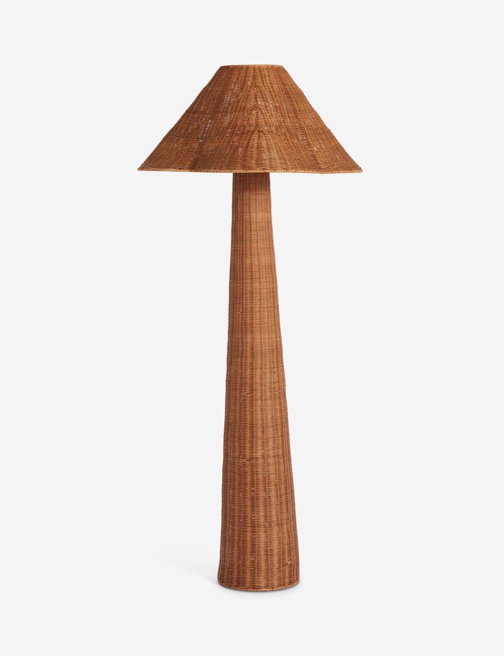 a wooden lamp with a brown shade on the top and bottom part, in front of a white background