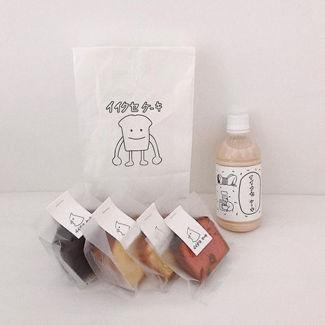 four different types of food in plastic bags next to a bottle and bag with writing on it