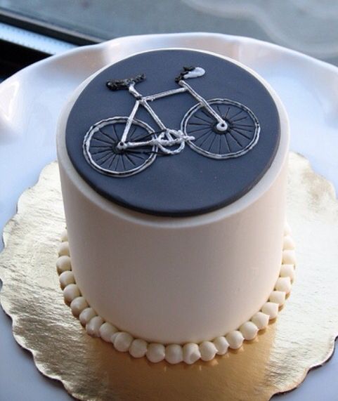 a cake decorated with a bicycle on it