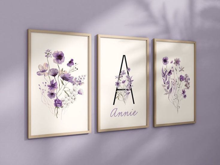 three framed art pieces with purple flowers and the eiffel tower