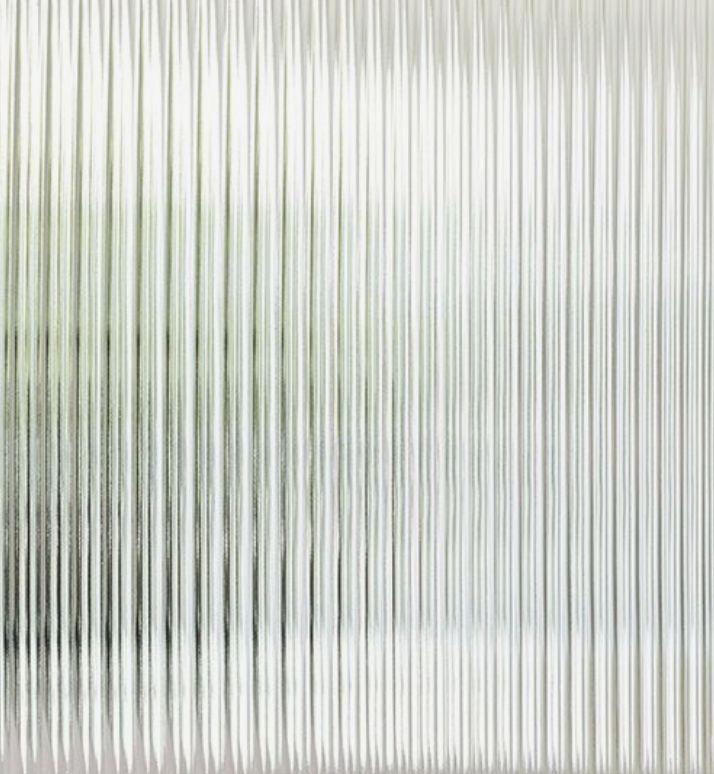 an abstract photo of lines in white and green