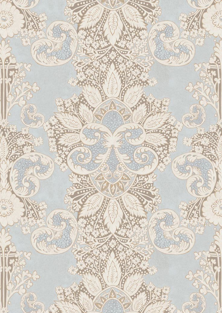 a blue and beige wallpaper with an ornate design