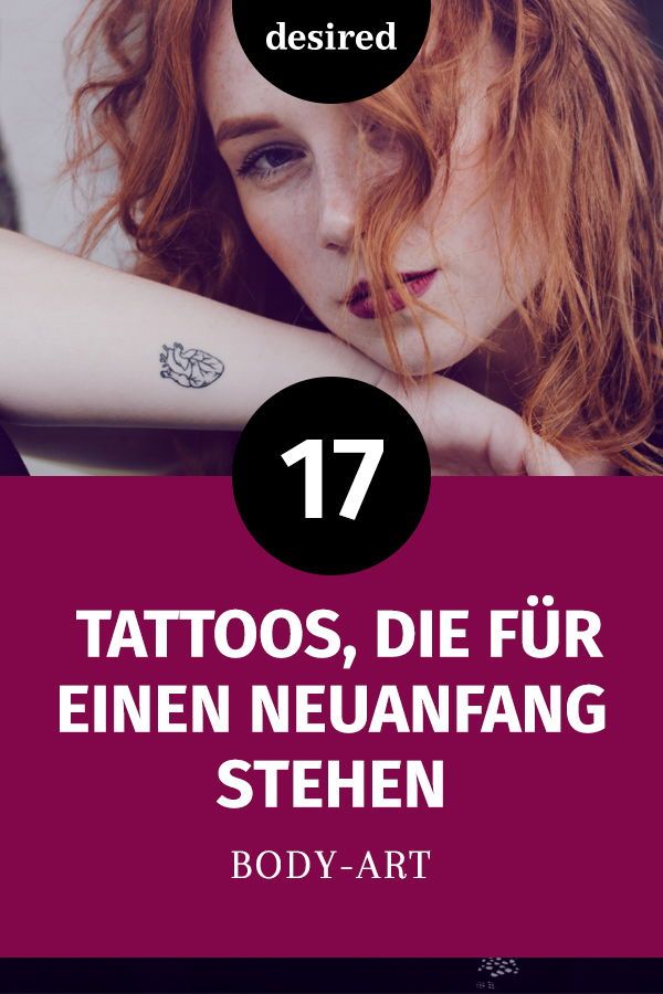 a woman with red hair and tattoos on her arm