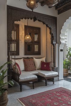 a living room filled with lots of furniture and decor on top of a white floor