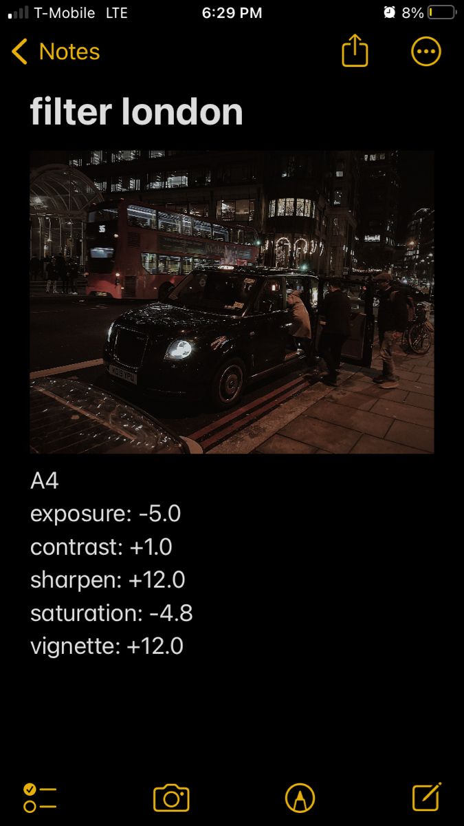 an iphone screen with the text filter london on it and people standing outside at night