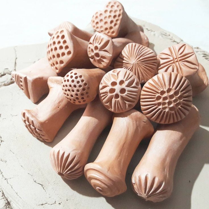 several wooden knobs sitting on top of a table