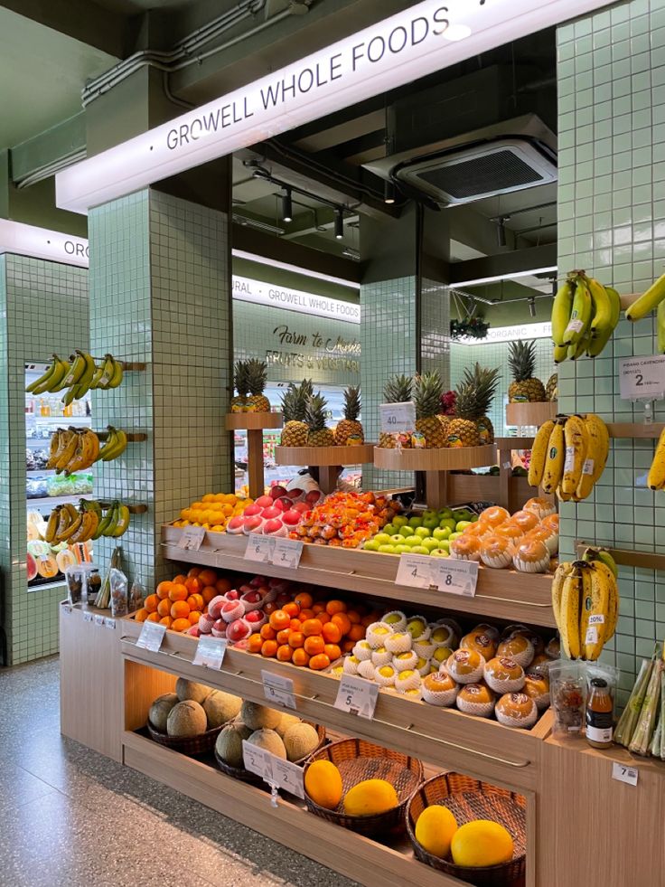 a store filled with lots of different types of fruits and veggies on display