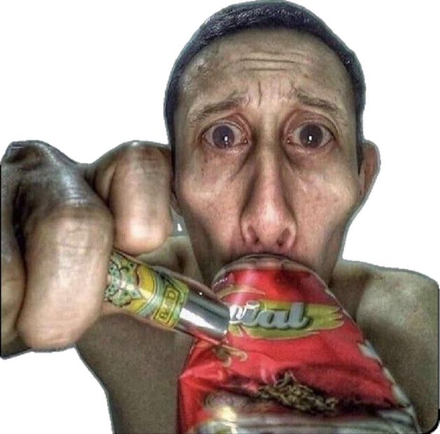 a man eating a bag of food with his mouth wide open and holding a drink in front of his face