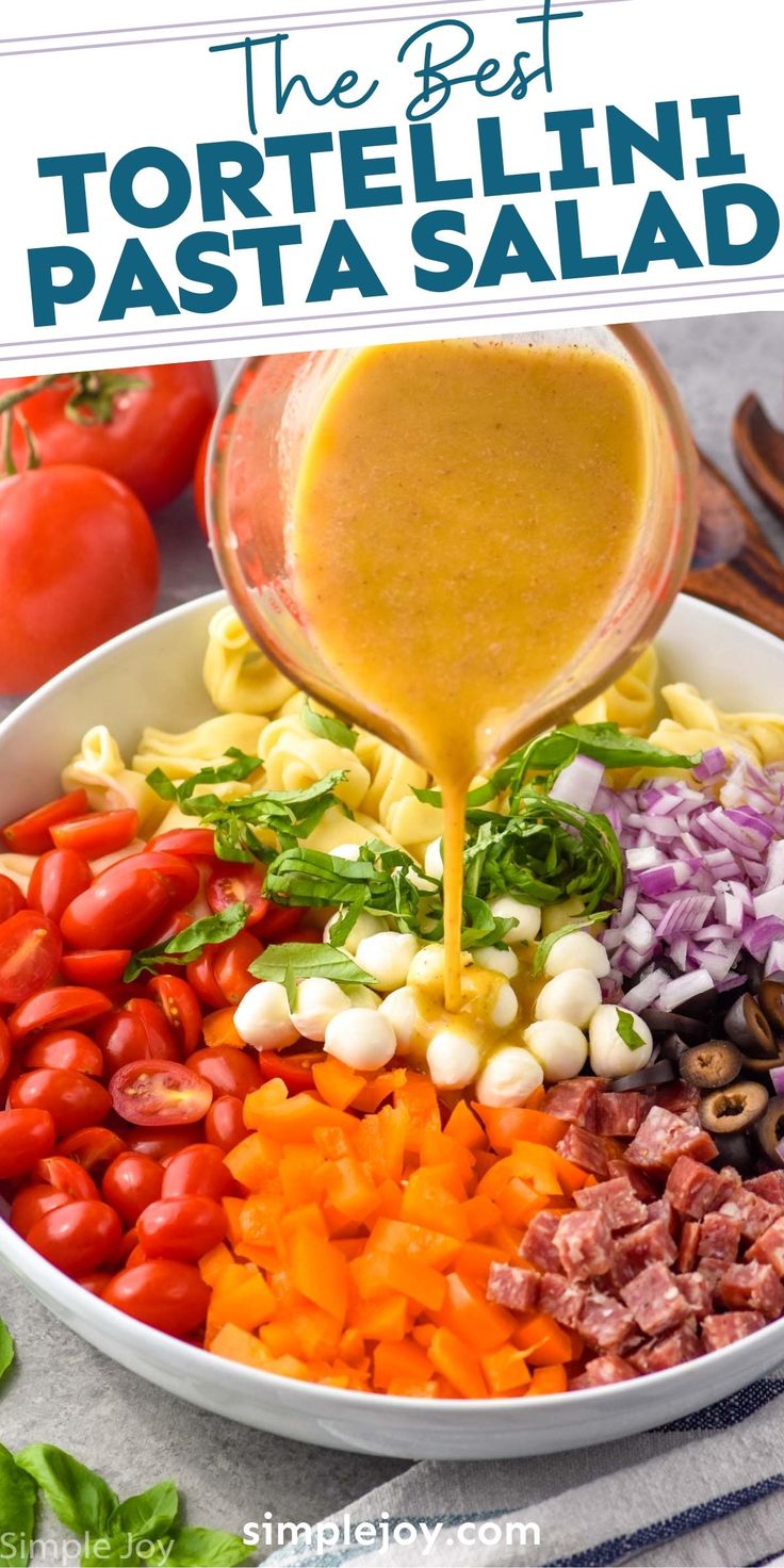 the best tortellini pasta salad recipe is made with fresh ingredients like tomatoes, bell peppers, garlic, and parmesan cheese