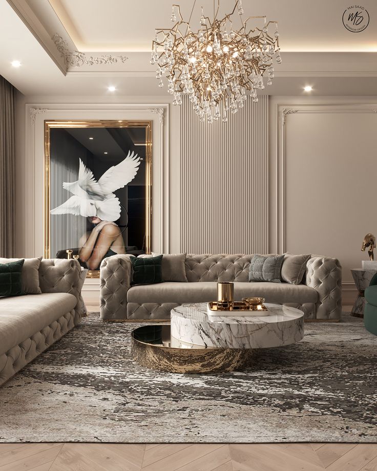 a living room with couches, tables and chandelier