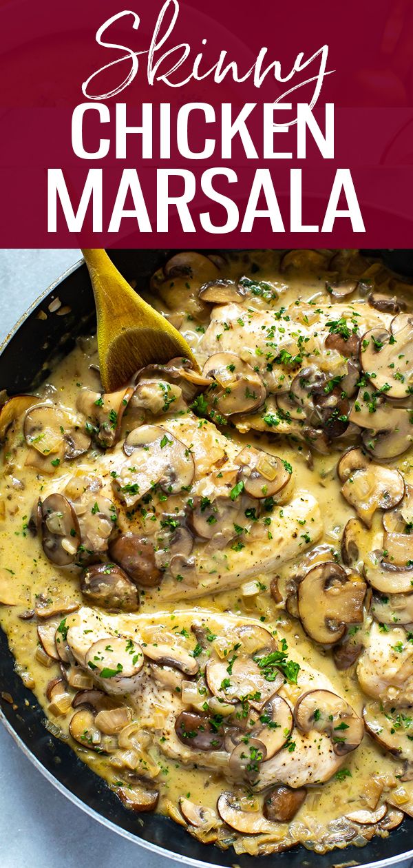 chicken marsala with mushrooms and parsley in a skillet