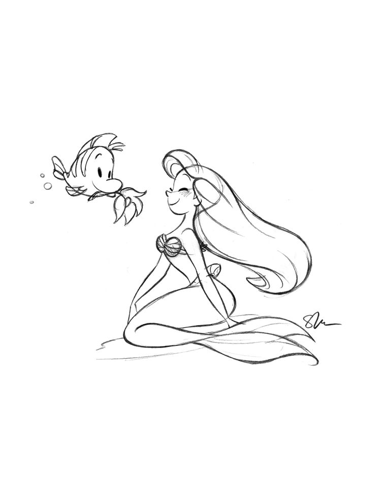 the little mermaid is sitting on her stomach and looking at an object in the air