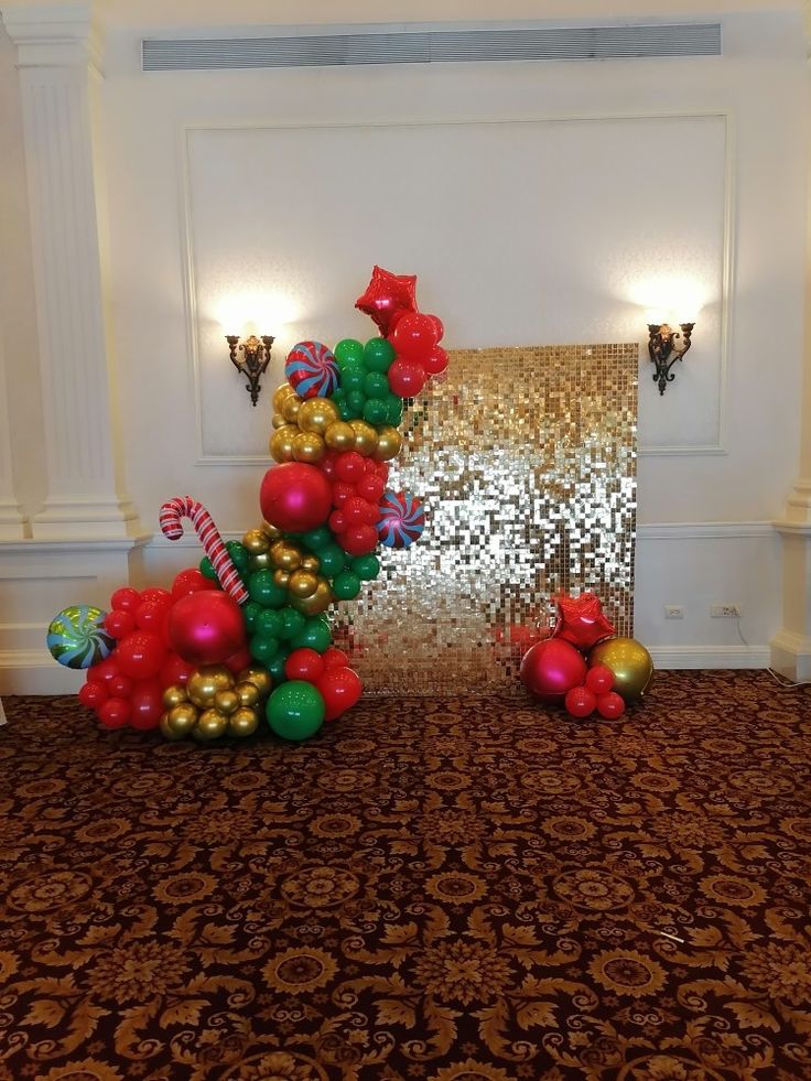 a large balloon arch in the middle of a room