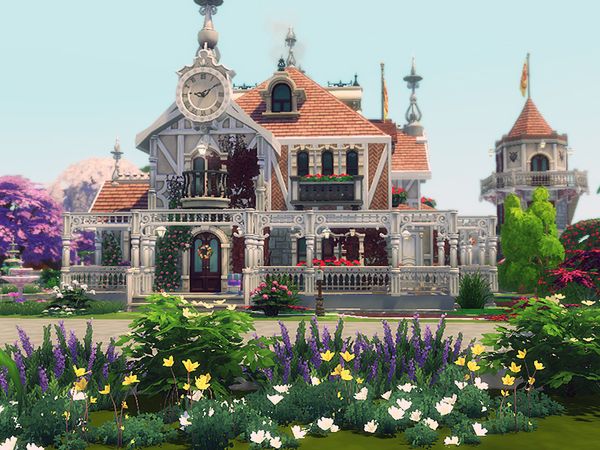 a large house with lots of flowers in front of it and a clock on the tower