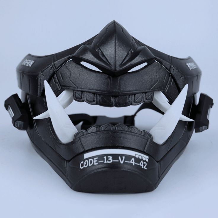 This cyberpunk LED oni mask has been handcrafted meticulously by our skilled artisans, using the latest 3D printer technology. Details: We have padded the inside of the mask for your facial comfort. The mask can stay on your face for a long time in the activity you use. It does not cause pain on your face and you can breathe comfortably. It is very robust in your activities with its high filling and extra layer thickness. You can adjust it according to your face with its adjustable straps. If yo Black Mask For Halloween Protection, Black Protective Mask For Halloween, Modern Black Masks And Prosthetics For Masquerade, Modern Black Masquerade Masks And Prosthetics, Futuristic Black Masks For Halloween, Black Halloween Mask For Protection, Cyberpunk Black Mask For Masquerade, Black Cyberpunk Mask For Masquerade, Cyberpunk Masks For Halloween Protection