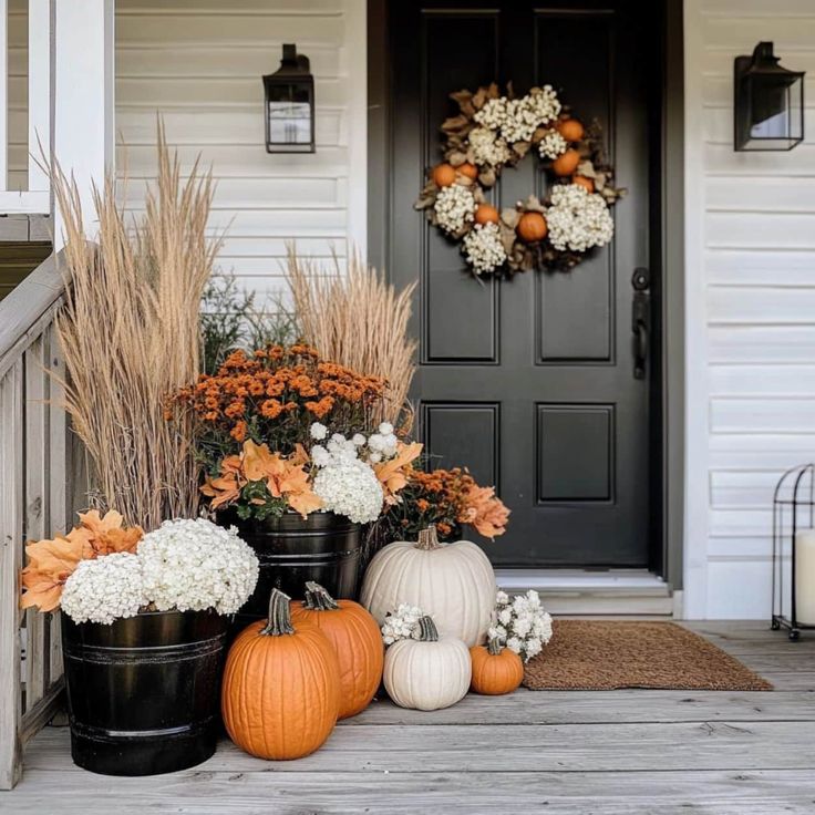 fall front porch decor with pumpkins and flowers