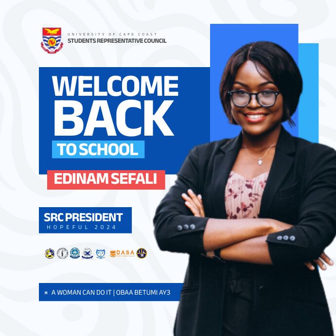 a woman wearing glasses standing in front of a welcome back to school sign with her arms crossed