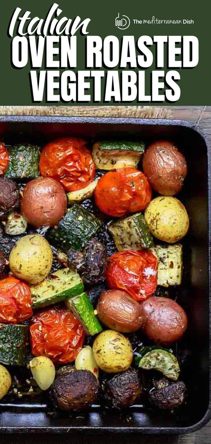 roasted vegetables in a roasting pan with text overlay that reads italian oven roasted vegetables