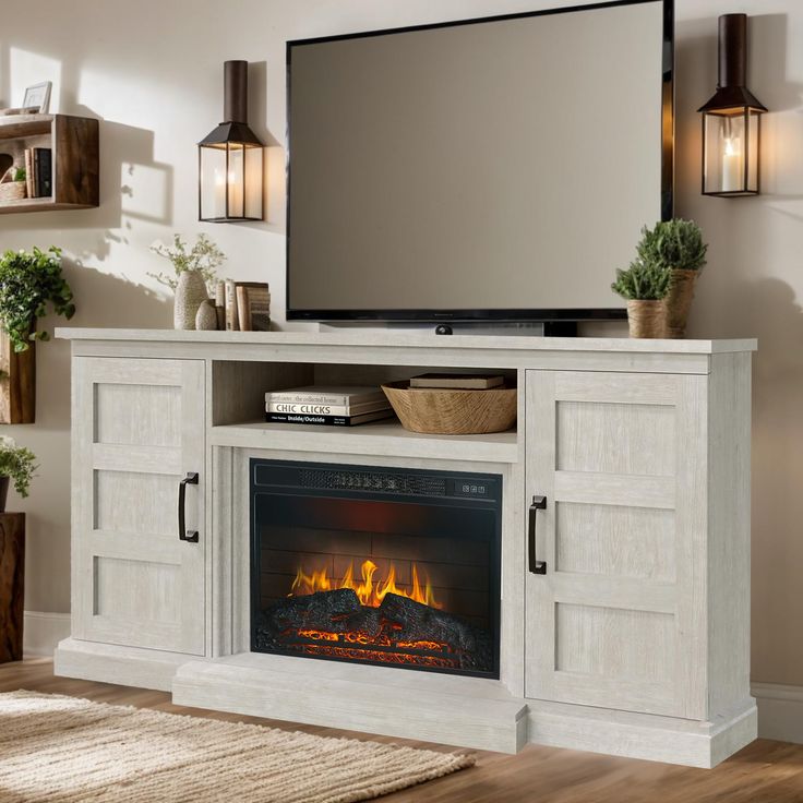 an entertainment center with a fireplace and flat screen tv