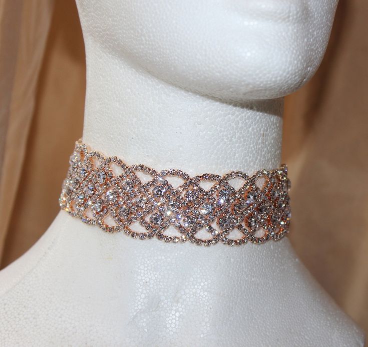 Stunning choker with a beautiful shine. The choker has a long extension so you can be adjusted to fit perfectly around your neck. Give your outfit a little sparkle with this perfect trading choker. This rhinestone choker comes in gold topaz as shown, rose gold, gold ab silver, and black diamond.  This listing is for 1 piece This rhinestone trim is 1 1/4'' wide and 10'' long with a 5'' extension. Item ships in 3-5 business days. If you have any questions please let us know we are here to help. Th Gold Jewelry Bridal, Rose Gold Choker, Pig Necklace, Diamond Flower Pendant, Choker Necklace Designs, Choker Black, Gold Necklace Indian, Bridal Choker, Gold Necklace Indian Bridal Jewelry