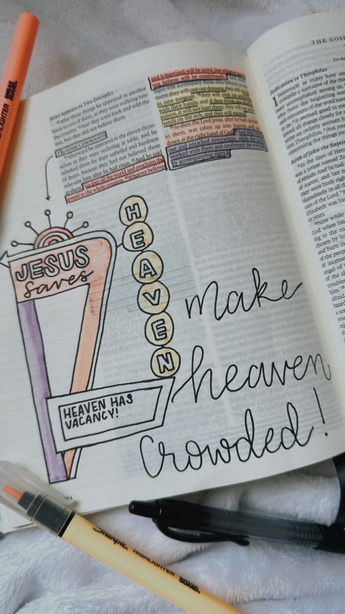 an open bible with the words jesus made heaven crowded written on it next to pens and markers