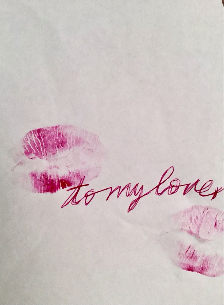 a piece of paper with writing on it that says, sorry love and two pink lips