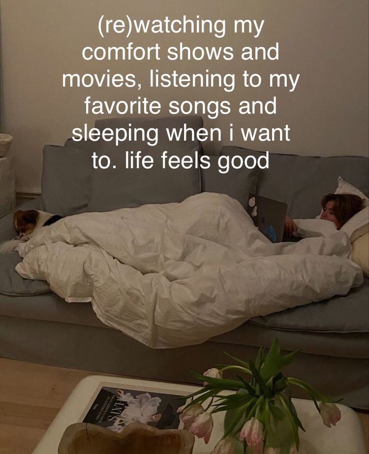 a person laying on top of a couch under a blanket with the words watching my comfort shows and movies, listening to my favorite songs and sleeping when i want to