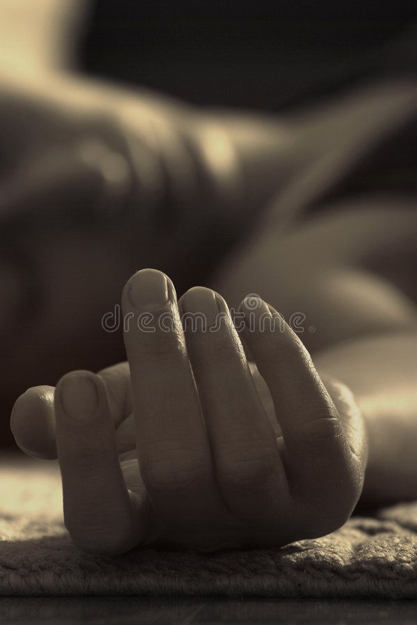 a person laying down with their hands on the floor royalty images and clippings