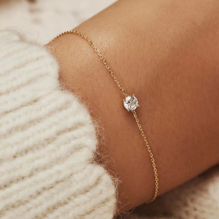 This Brand New Charlotte Bracelet Is 18k Gold Plated High Quality Sterling Silver. The Jewel Is Cubic Zirconia. It’s Beautiful And Dainty! Perfect For A Minimalist, Understated Look. Comes In Boutique Microfiber Jewelry Pouch To Keep Your New Ring Clean And Safe. Reasonable Offers Are Always Welcome! #Tiny Gold Bracelet, Gold Bracelet, Gold Plated Bracelet, Dainty Gold Bracelet, Dainty Bracelet, Minimalist Jewlery, Gold Chain Bracelet, Cubic Zirconia Bracelet, Gold Cubic Zirconia Bracelet, Minimalist Bracelet Shopping For These Styles? Summer Spring Boho Picnic Hippie 60’s 70’s 80’s 90’s Festival Soft Girl Y2k Holiday Party Dressing Chunky Crochet Maximalist Cor White Gold Diamond Bracelet, Tarnish Resistant, Elegant Gold Bracelet In Diamond White For Gifts, Timeless Diamond Cut Chain Bracelet Gift, Timeless Diamond Cut Chain Bracelet As Gift, Dainty Diamond White Jewelry With Si Clarity, Fine Jewelry Cubic Zirconia Chain Bracelet With Single Diamond, Diamond White Bracelet With Single Diamond, Elegant Diamond White Chain Bracelet Gift, Elegant Diamond White Chain Bracelet As Gift