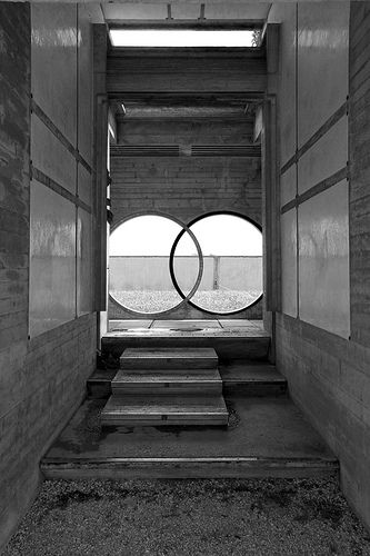 a black and white photo with two circular windows