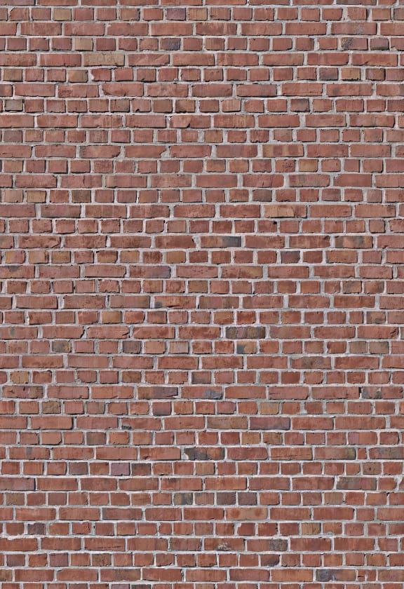 a red brick wall is shown with no mortar